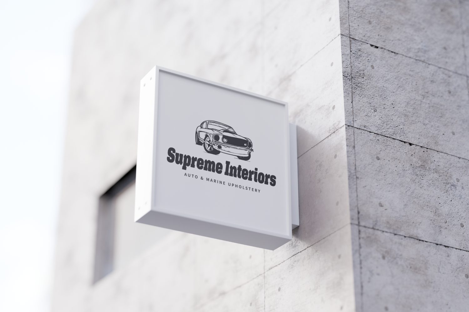 Supreme Interiors blade sign on a Fort Collins storefront